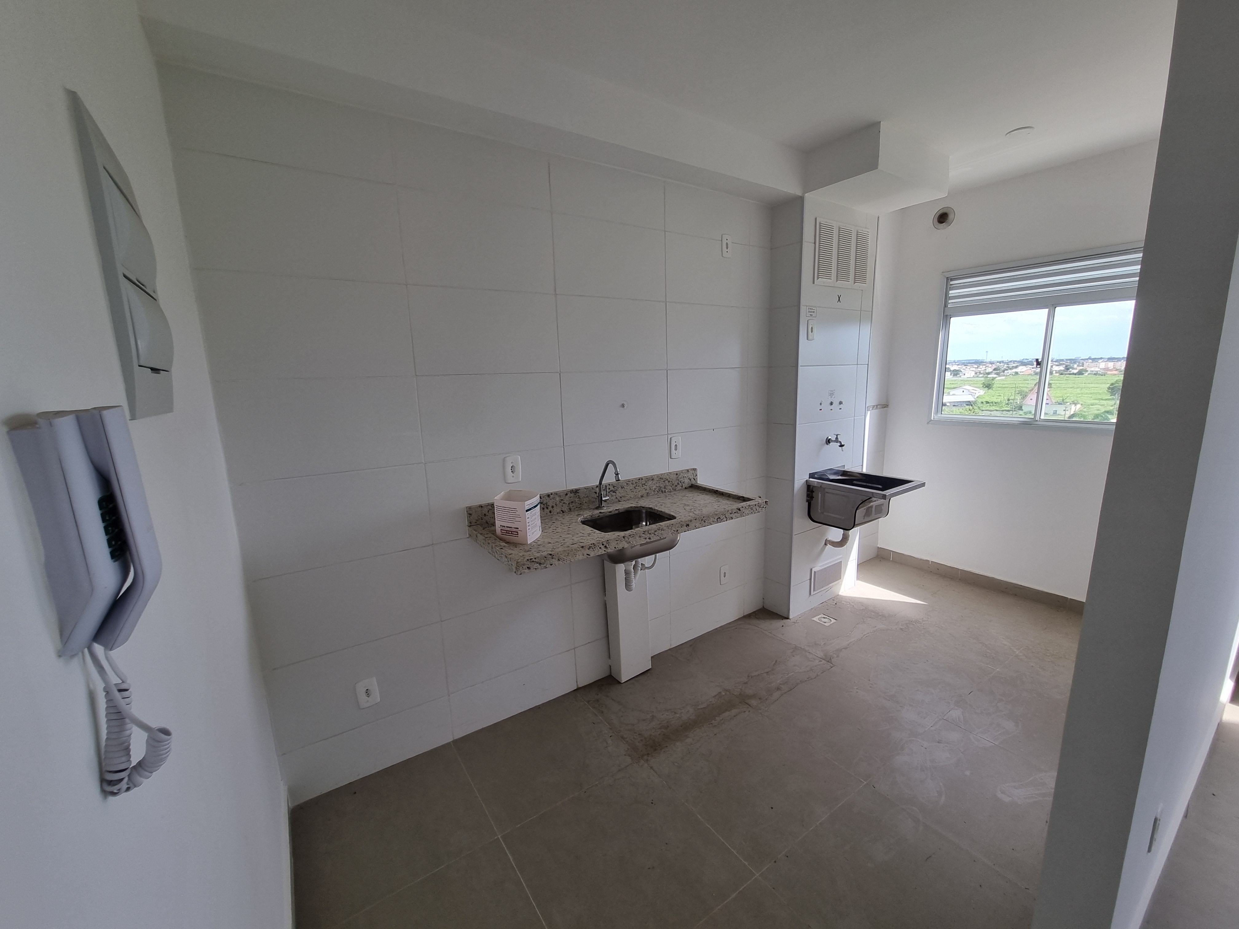 Cozinha com bancada em granito